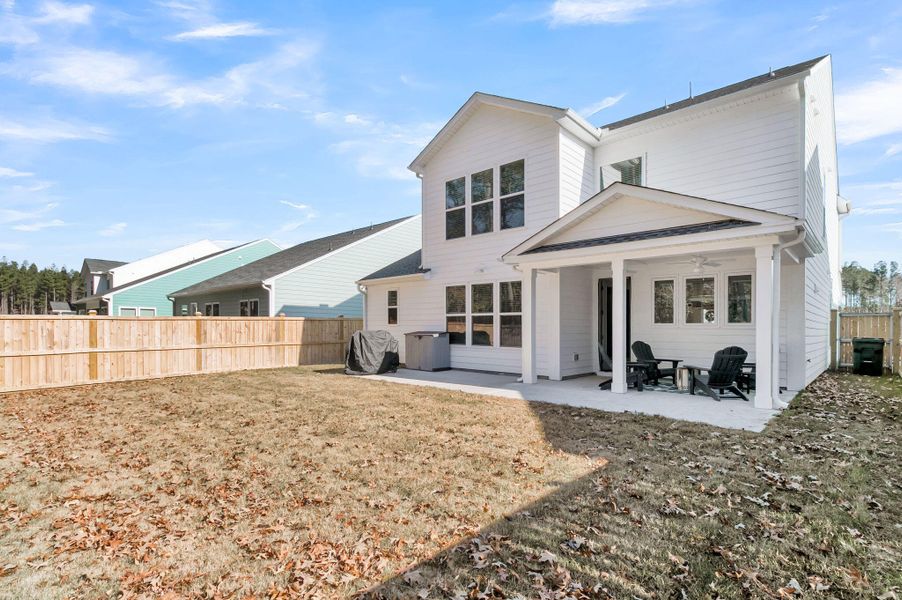 Exterior details and patio area of a home in , Ravenel (Image 28).