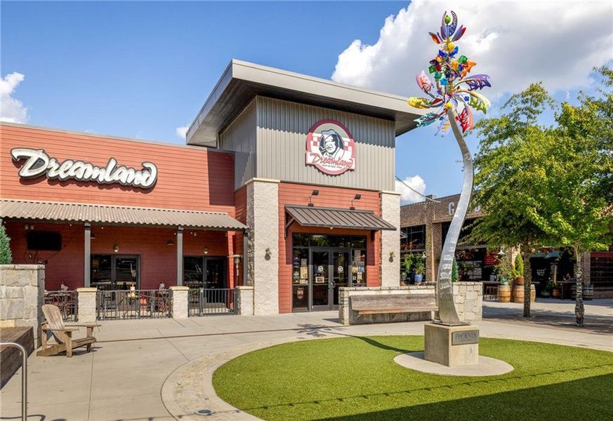 Front exterior of a new home in Evanshire Single Family, Duluth, GA, highlighting curb appeal (Image 1). Front exterior of a new home in Evanshire Single Family, Duluth, GA, highlighting curb appeal (Image 1).