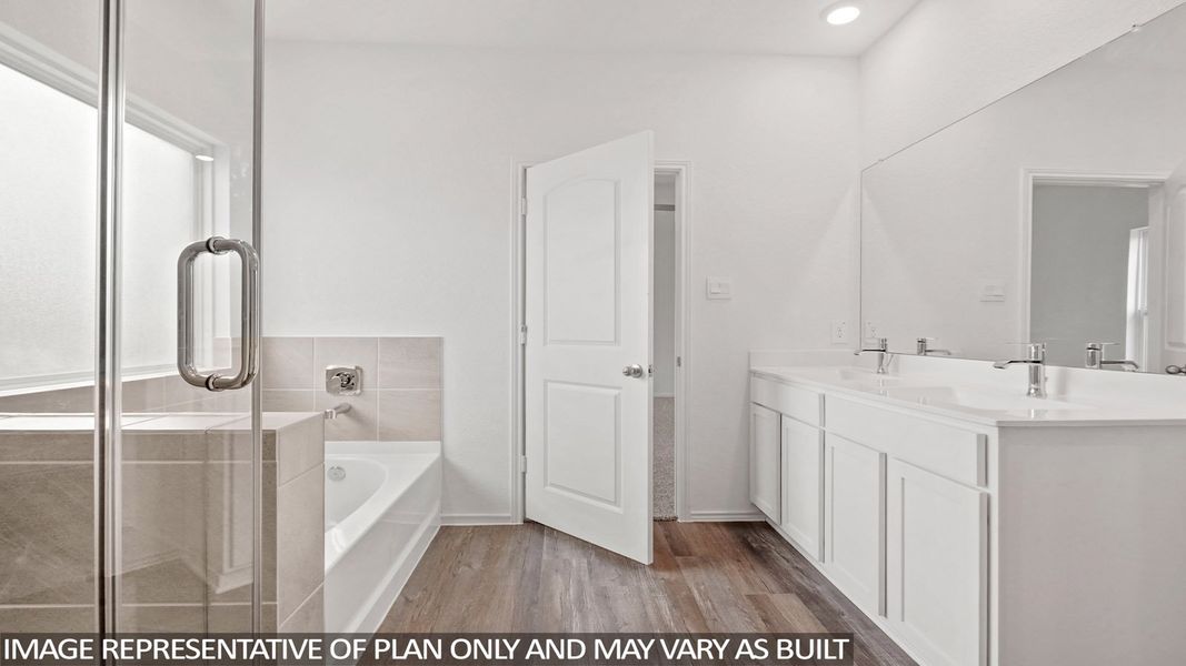 Furnished interior view inside a new home in Sunterra, Katy (Image 9).