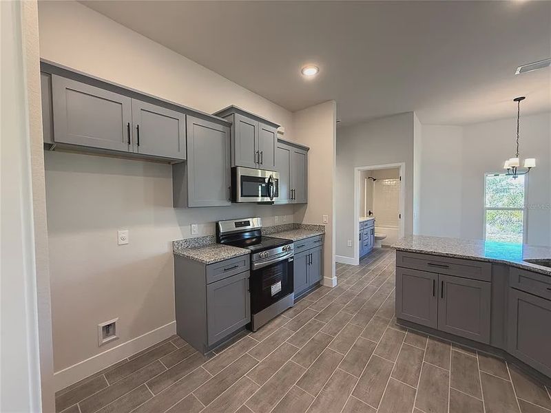 Furnished interior view inside a new home in South Gulf Cove, Port Charlotte (Image 6).