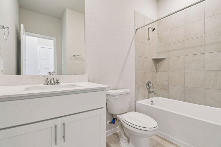 Furnished interior view inside a new home in Granger Pointe - Traditional Series, New Caney (Image 15).