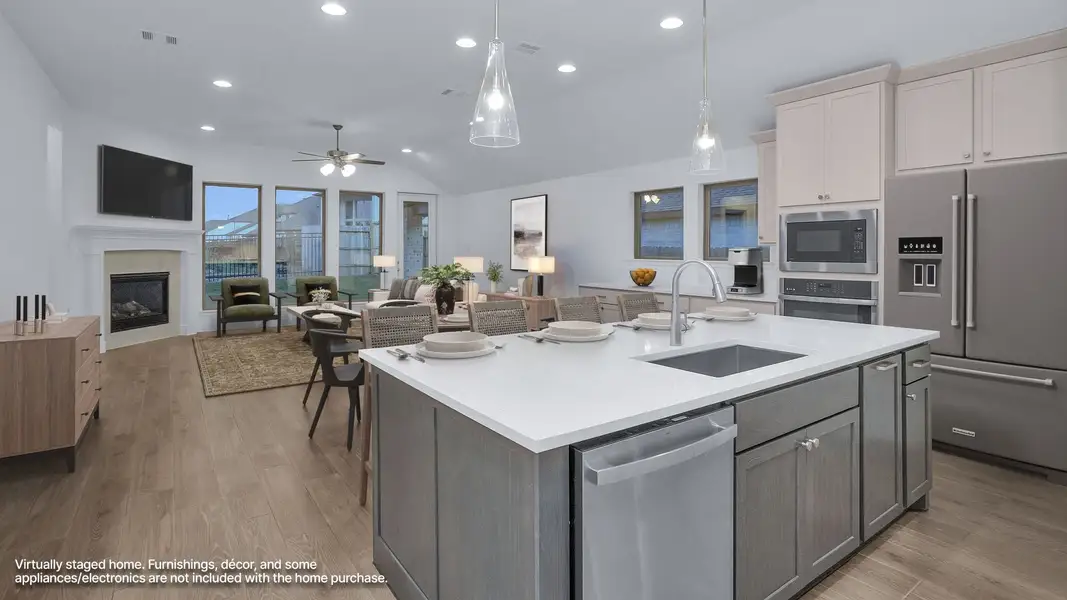 Furnished interior view inside a new home in Grand Central Park, Conroe (Image 5).