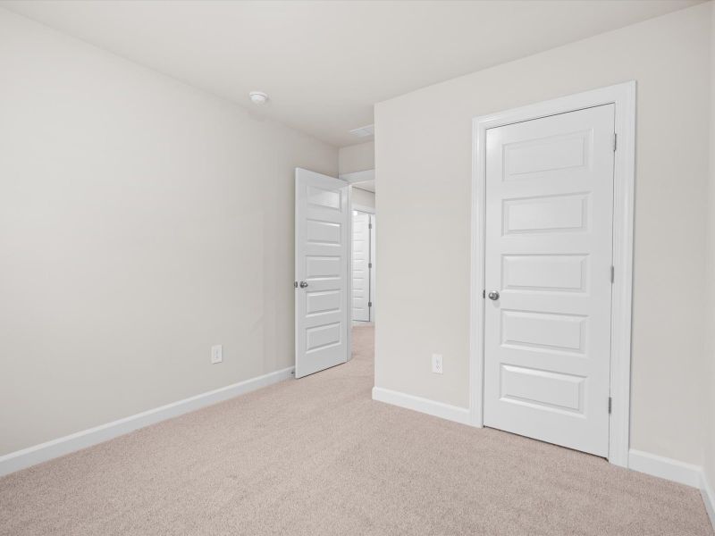 Spacious, unfurnished interior of a new home in Crossing at Abner Creek Townes, Greer (Image 17).