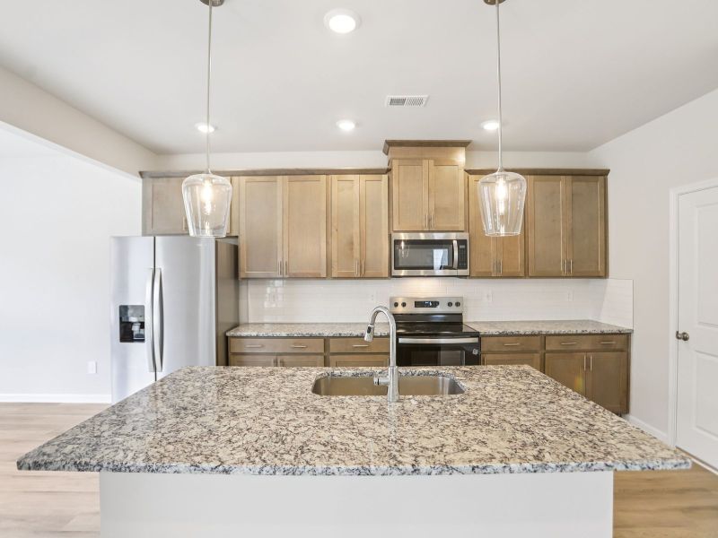 Furnished interior view inside a new home in Hawthorne Station, College Park (Image 6).