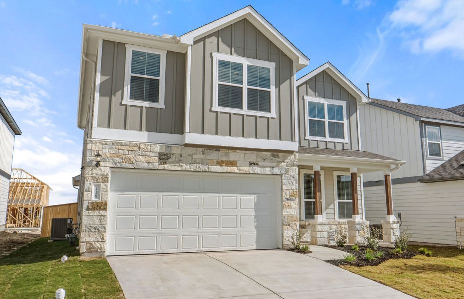 Front exterior of a new home in Patterson Ranch, Georgetown, TX, highlighting curb appeal (Image 18).