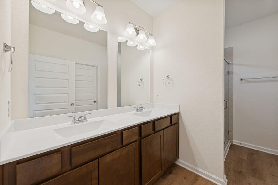 The Mockingbird II- Primary Bathroom with Dual Vanities The Mockingbird II- Primary Bathroom with Dual Vanities