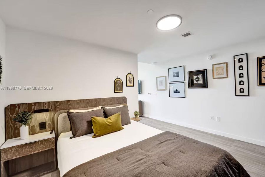 Furnished interior view inside a new home in , Miami Beach (Image 12). Furnished interior view inside a new home in , Miami Beach (Image 12).