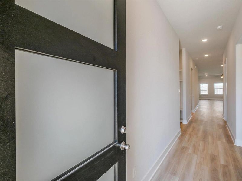 Spacious, unfurnished interior of a new home in Sunterra, Katy (Image 17).