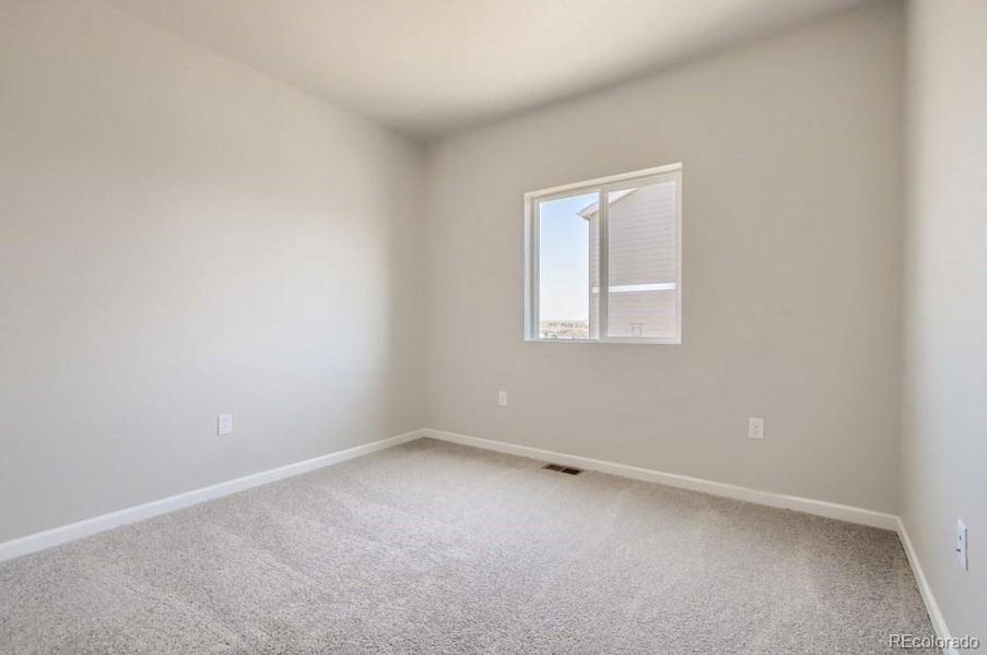 Spacious, unfurnished interior of a new home in Red Barn Meadows, Mead (Image 13).