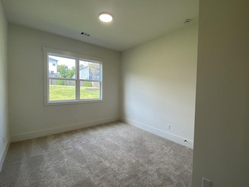 Spacious, unfurnished interior of a new home in Hillshire, Cumming (Image 23).