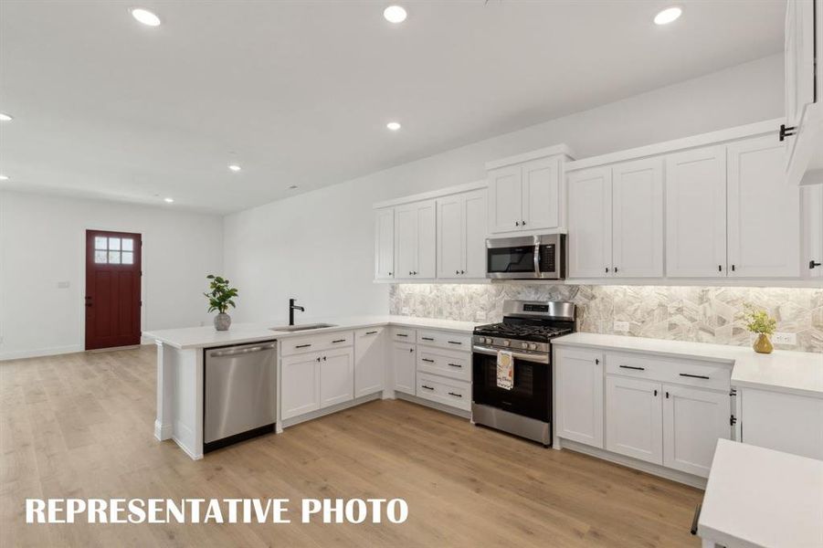 Thoughtfully designed and finished in style, any chef would be proud to call this dream kitchen their own!  REPRESENTATIVE PHOTO