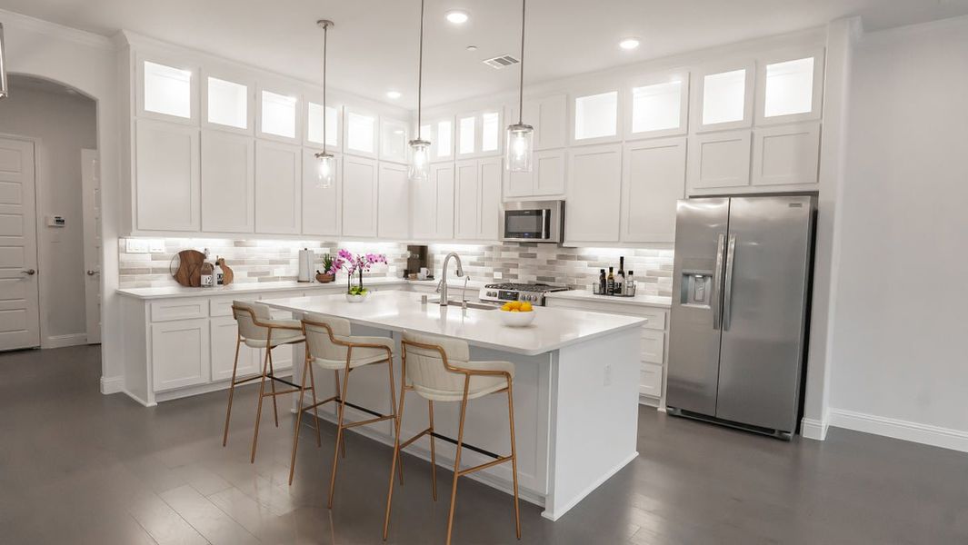 Representative furnished interior of a home built from the Dogwood R by First Texas Homes in The Abbey at Mercer Crossing, Farmers Branch (Image 5).