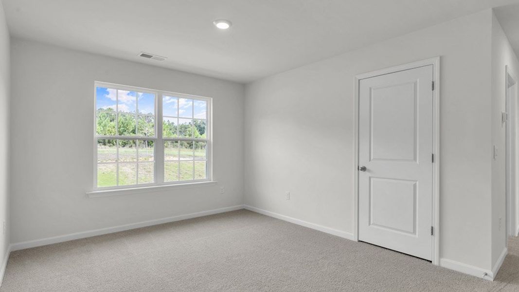 Spacious, unfurnished interior of a new home in The Preserve at Kinsley, Jamestown (Image 24). Spacious, unfurnished interior of a new home in The Preserve at Kinsley, Jamestown (Image 24).