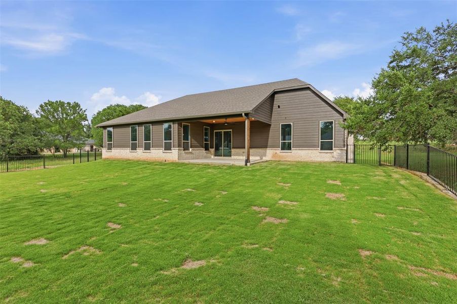 Exterior details and patio area of a home in , Granbury (Image 25). Exterior details and patio area of a home in , Granbury (Image 25).