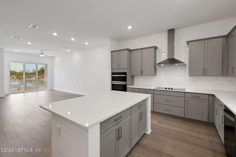 Furnished interior view inside a new home in North Beach Townhomes, Jacksonville Beach (Image 11).
