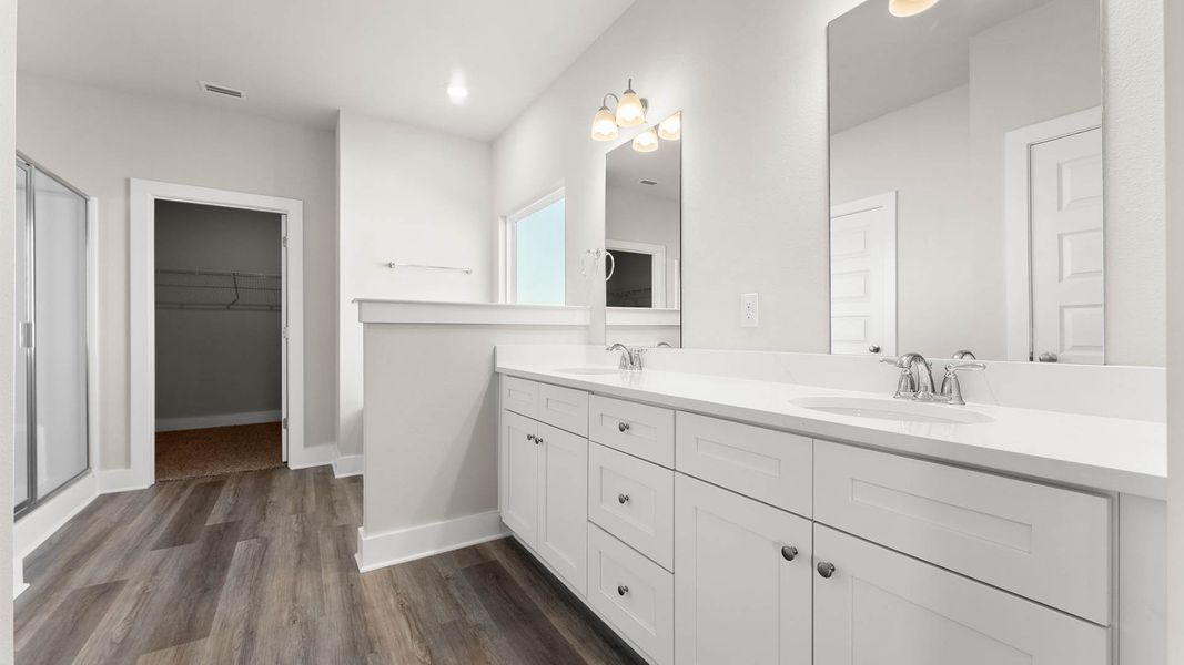 Representative furnished interior of a home built from the The Mckenzie by D.R. Horton in Liberty, Panama City (Image 9).