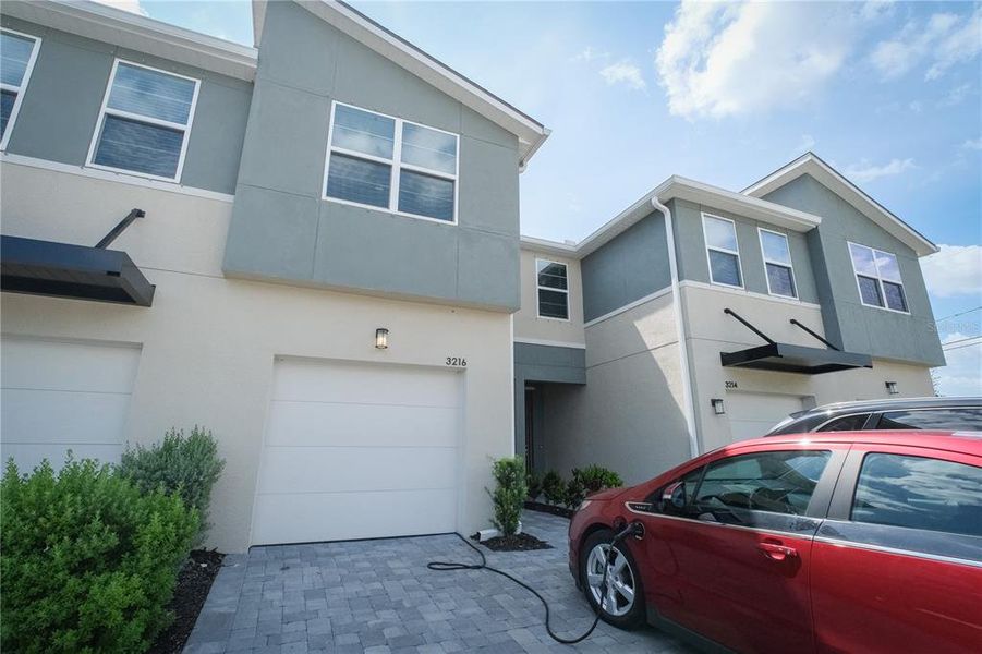Front exterior of a new home in , Brandon, FL, highlighting curb appeal (Image 21).