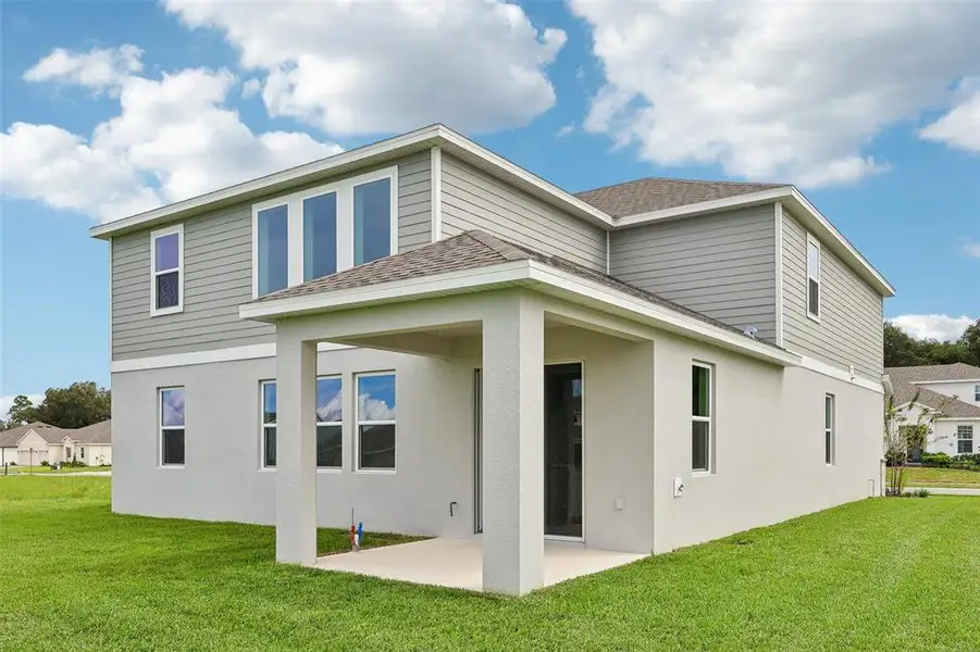 Exterior details and patio area of a home in , Mount Dora (Image 3).