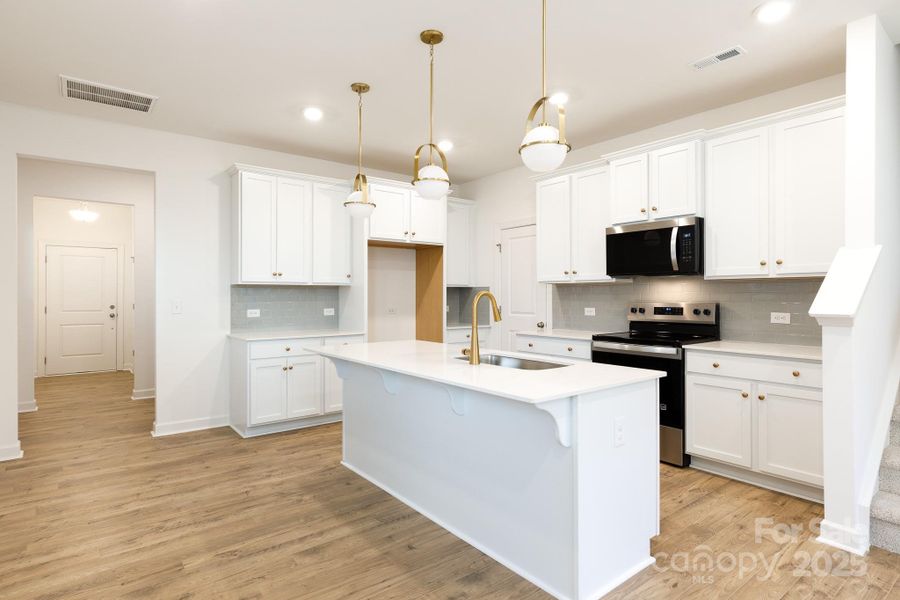 Furnished interior view inside a new home in , Charlotte (Image 8).