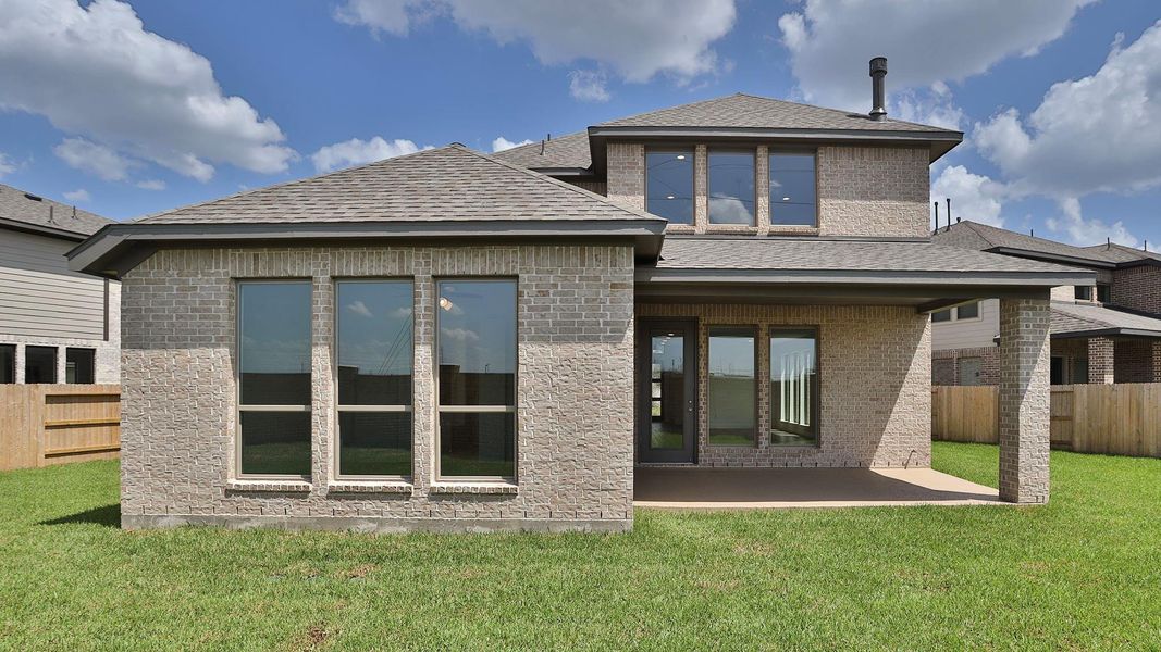 Front exterior of a new home in Marvida 45' - Gated, Cypress, TX, highlighting curb appeal (Image 2). Front exterior of a new home in Marvida 45' - Gated, Cypress, TX, highlighting curb appeal (Image 2).