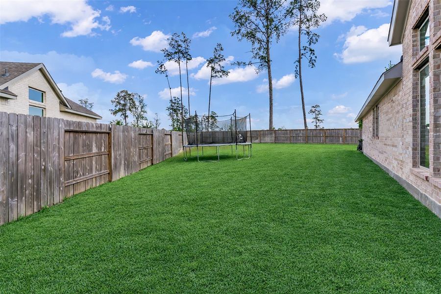 Over 1/4 acre of land with no back neighbors!