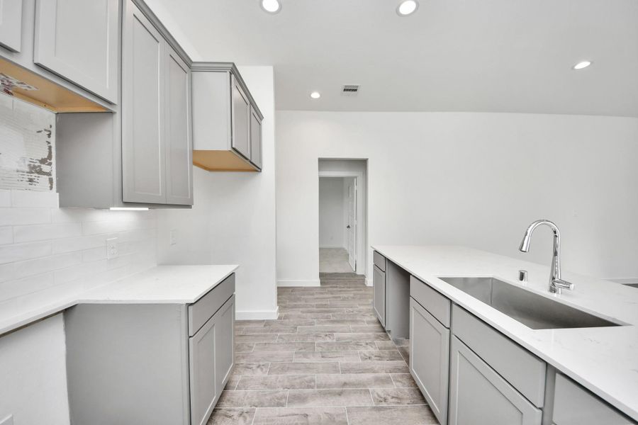 This generously spacious kitchen is a dream realized!