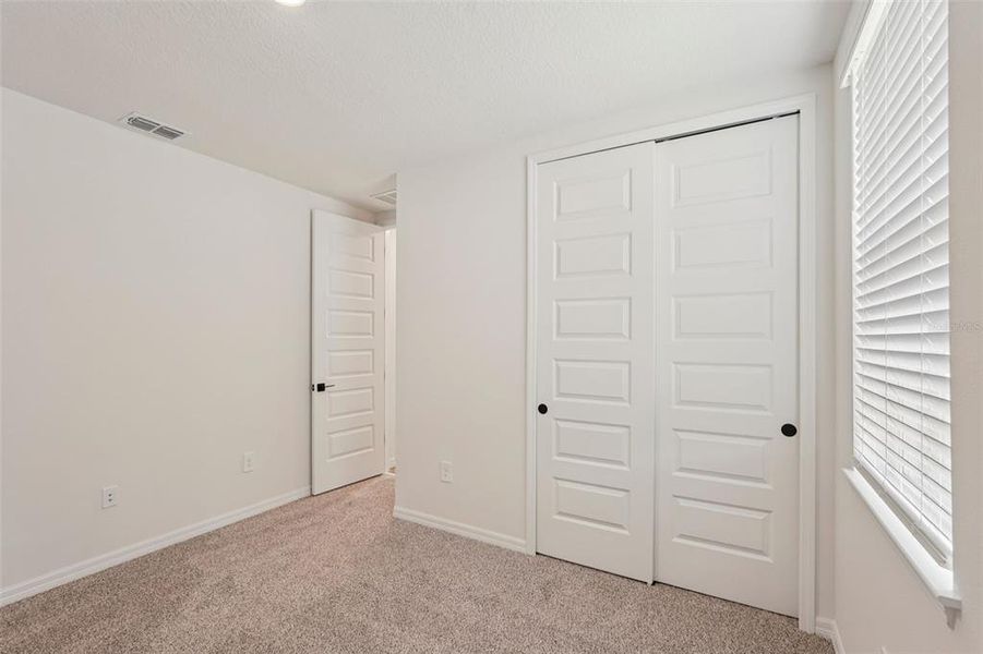 Spacious, unfurnished interior of a new home in Oakfield Trails - Signature Series, Parrish (Image 25).