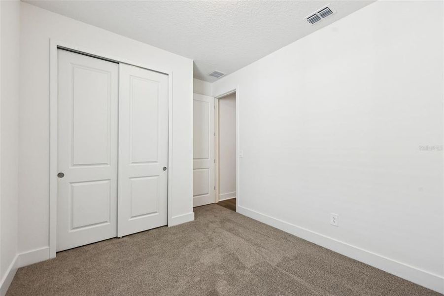 Spacious, unfurnished interior of a new home in Ridgehaven - Signature Series, Ormond Beach (Image 28).