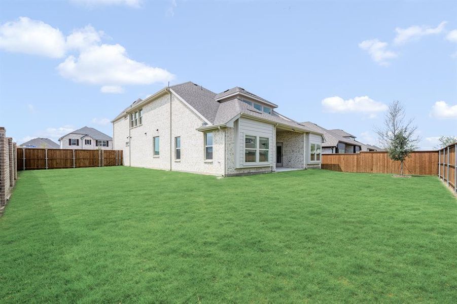 Exterior details and patio area of a home in Creekview Meadows, Pilot Point (Image 23). Exterior details and patio area of a home in Creekview Meadows, Pilot Point (Image 23).