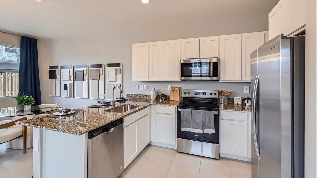 Representative furnished interior of a home built from the Denali by D.R. Horton in Parker Pointe, Homestead (Image 6). Representative furnished interior of a home built from the Denali by D.R. Horton in Parker Pointe, Homestead (Image 6).