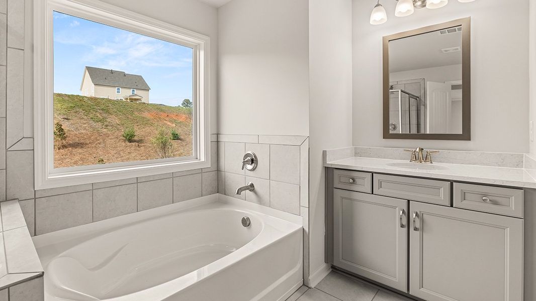 Representative furnished interior of a home built from the Bellview by D.R. Horton in Thalley Creek Estates, Cumming (Image 12).