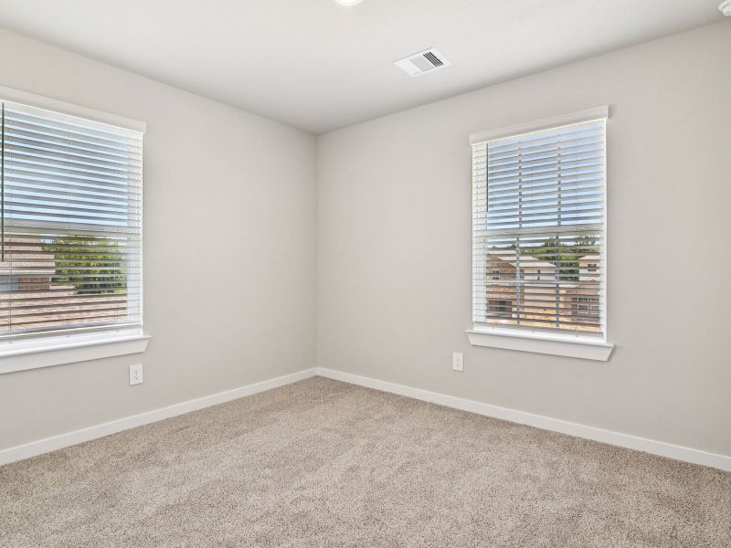 Spacious, unfurnished interior of a new home in Sanford Farms - Premier Series, Waller (Image 15).