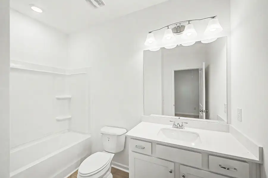 Upstairs hall bathroom. Upstairs hall bathroom.