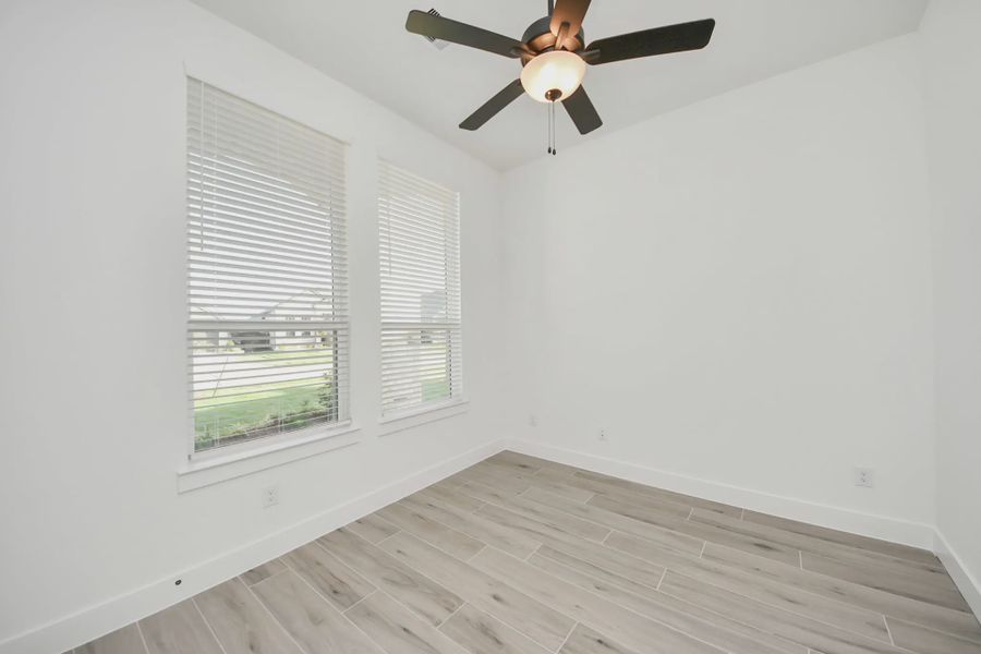 Representative unfurnished interior of a home built from the PT Bonneville by Chesmar Homes in Meridiana 50's and 60's, Manvel (Image 15).