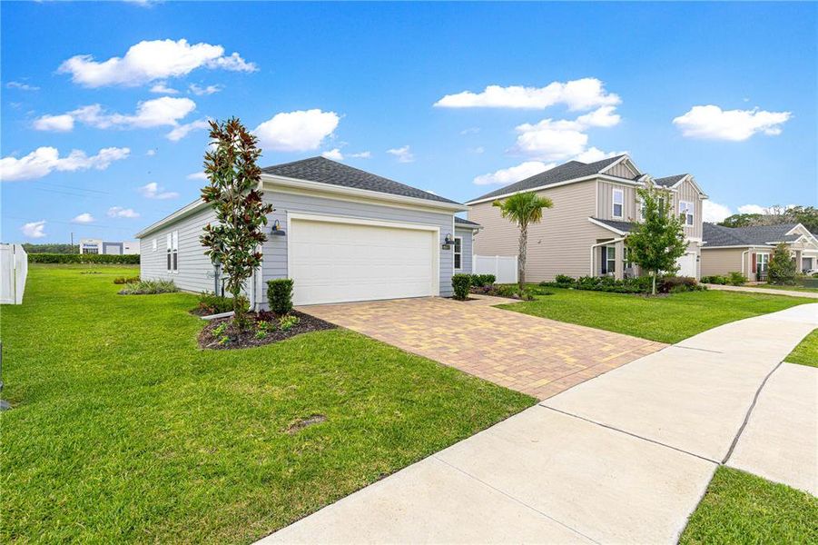Front exterior of a new home in , Ocala, FL, highlighting curb appeal (Image 23).