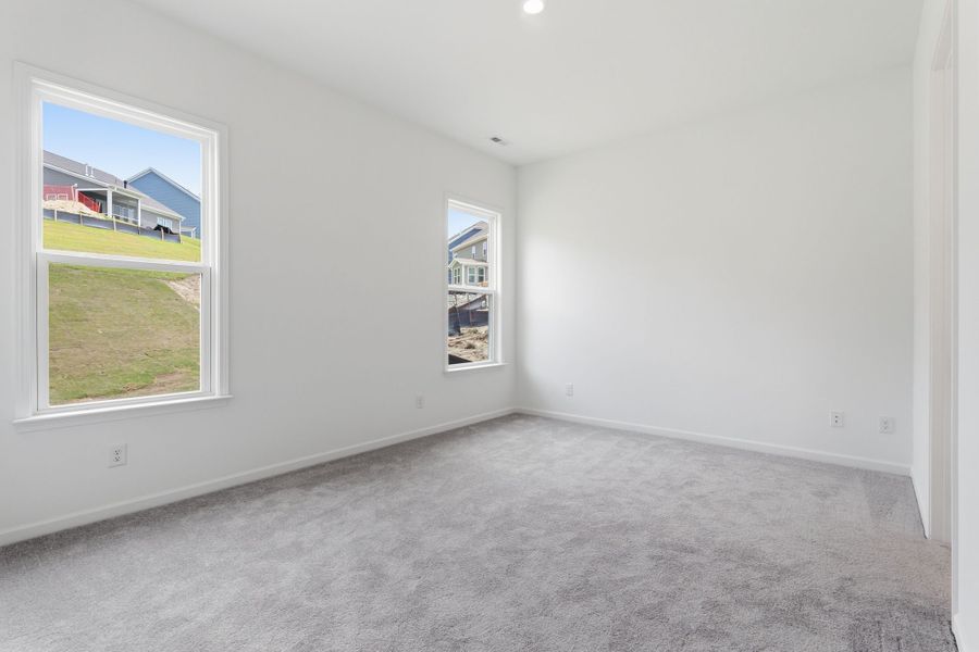Spacious, unfurnished interior of a new home in River Falls, Tega Cay (Image 13).