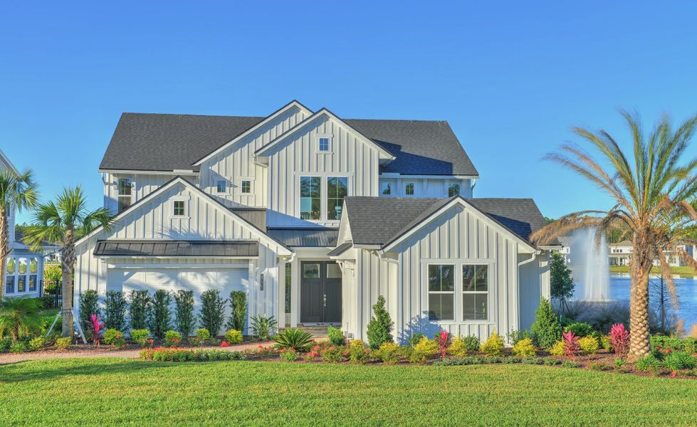 Front exterior of a new home in Middlebourne, St. Johns, FL, highlighting curb appeal (Image 1). Front exterior of a new home in Middlebourne, St. Johns, FL, highlighting curb appeal (Image 1).
