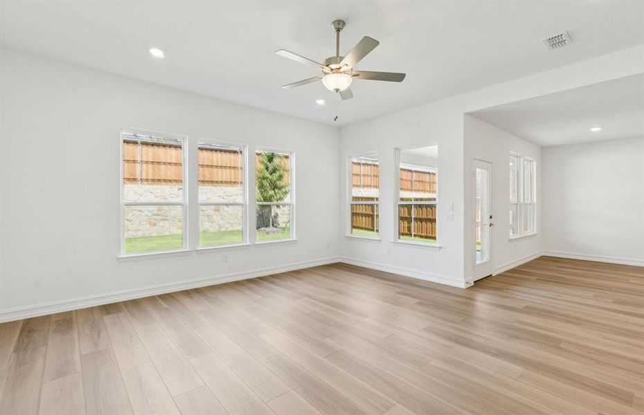 Sunlit gathering room designed for relaxation and entertainment Sunlit gathering room designed for relaxation and entertainment