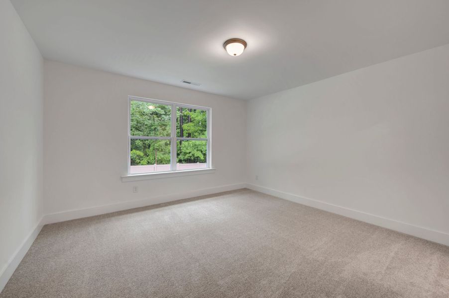 Spacious, unfurnished interior of a new home in Ashmore Townes, Garner (Image 17). Spacious, unfurnished interior of a new home in Ashmore Townes, Garner (Image 17).