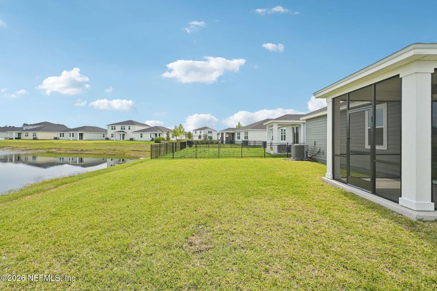 Exterior details and patio area of a home in Lakes at Bella Lago - Signature Series, Green Cove Springs (Image 17).