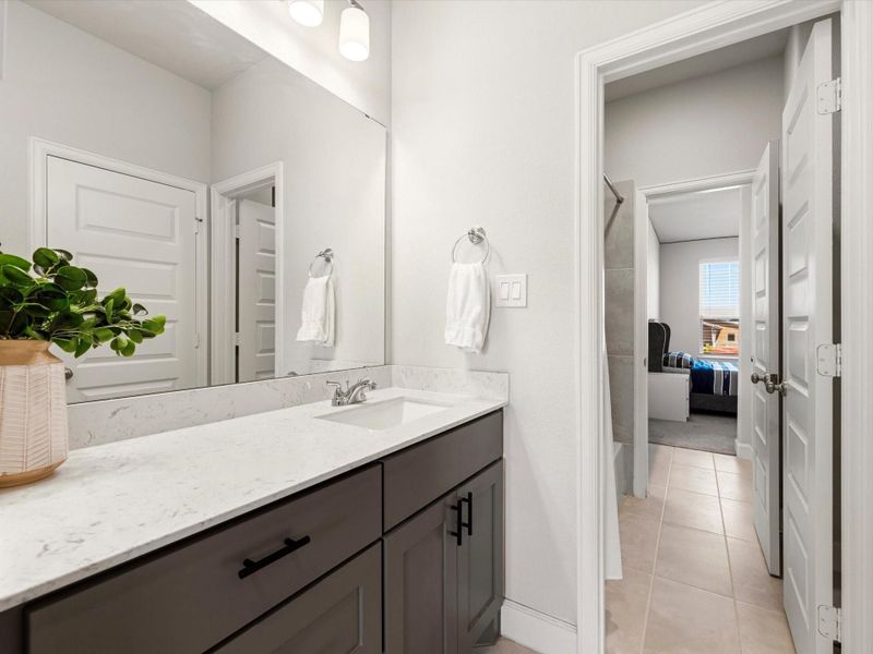 Mirror image of the sink and counter area connected to the 4th bedroom.
