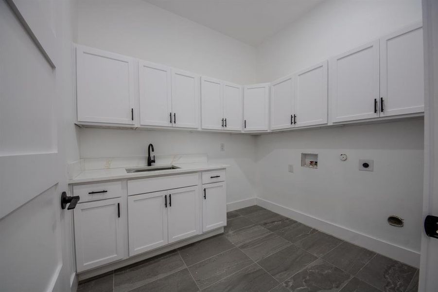 Laundry or Utility Room with Sink, Washer and Dryer Hookups and Cabinets Galore