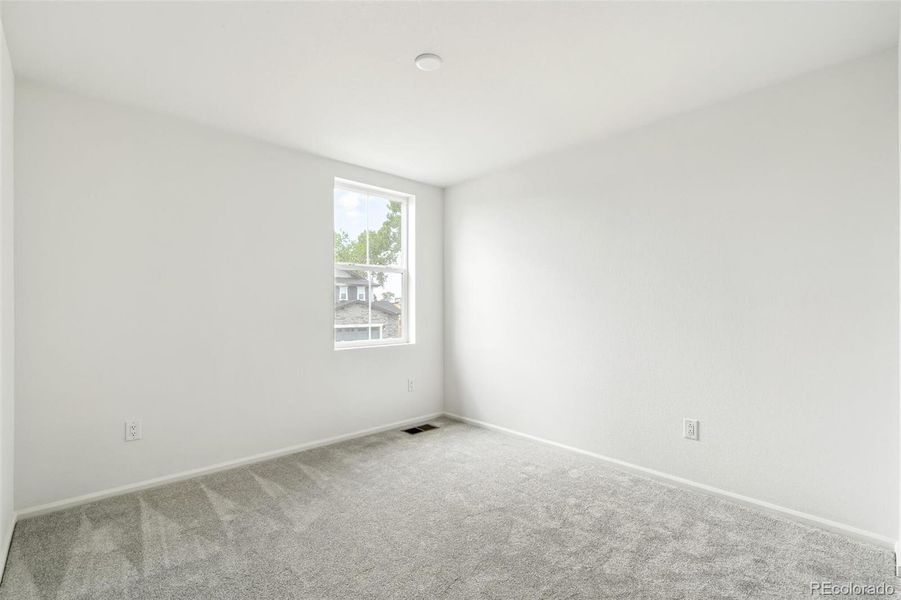 Spacious, unfurnished interior of a new home in Windsong, Thornton (Image 26).