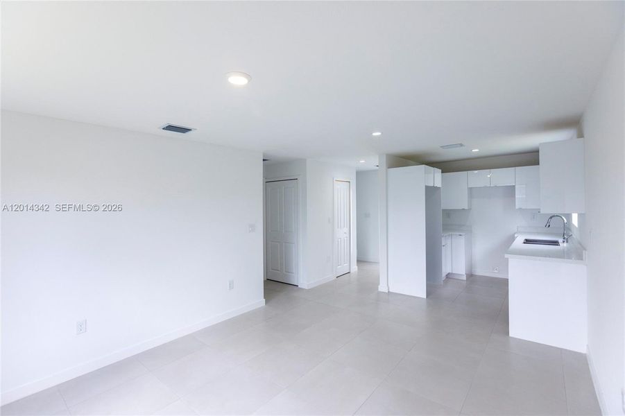 Spacious, unfurnished interior of a new home in , Miami (Image 7). Spacious, unfurnished interior of a new home in , Miami (Image 7).
