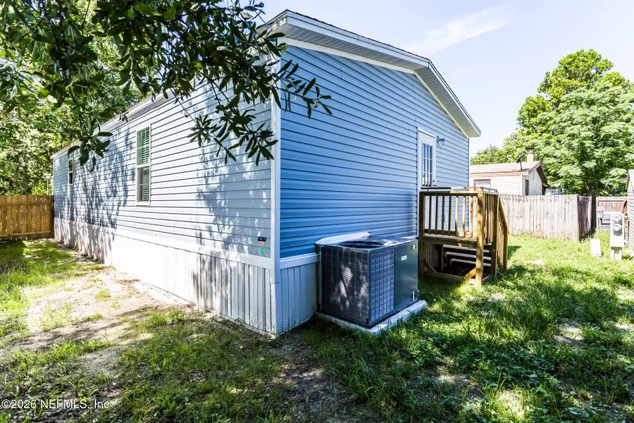Exterior details and patio area of a home in , Jacksonville (Image 16).