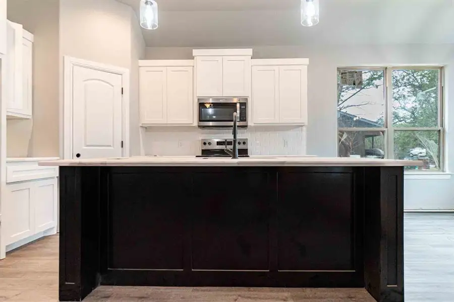 Furnished interior view inside a new home in , Granbury (Image 3).