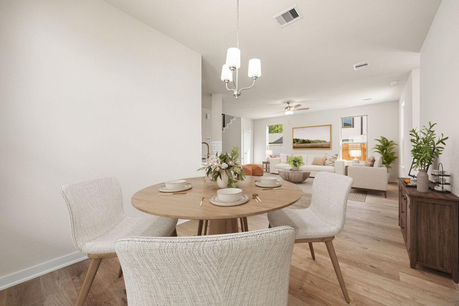 This inviting dining area flows effortlessly into the main living space, offering a bright and open layout enhanced by large windows that fill the room with natural light. Neutral tones and modern finishes create a timeless atmosphere, while the spacious design provides versatility for both everyday meals and special gatherings. The soft lighting and clean lines add a touch of sophistication, making this an ideal setting for relaxed, comfortable living. This inviting dining area flows effortlessly into the main living space, offering a bright and open layout enhanced by large windows that fill the room with natural light. Neutral tones and modern finishes create a timeless atmosphere, while the spacious design provides versatility for both everyday meals and special gatherings. The soft lighting and clean lines add a touch of sophistication, making this an ideal setting for relaxed, comfortable living.