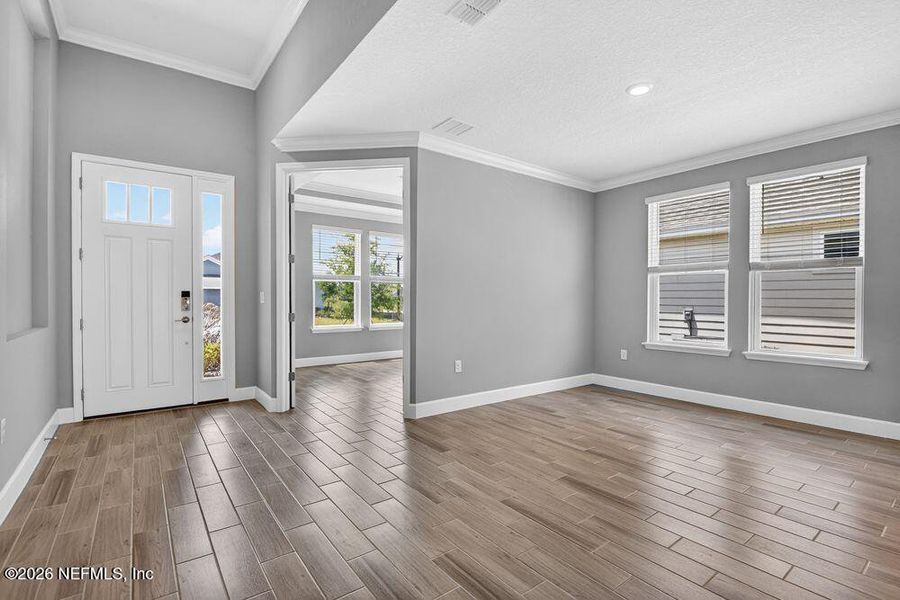 Spacious, unfurnished interior of a new home in Colbert Landings, Palm Coast (Image 28).