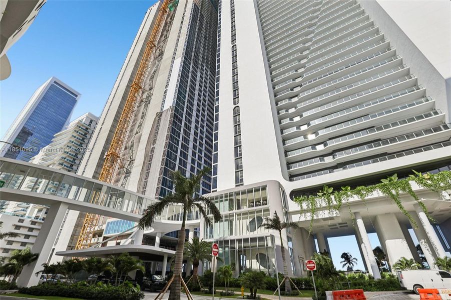 Front exterior of a new home in Aria Reserve, Miami, FL, highlighting curb appeal (Image 2).