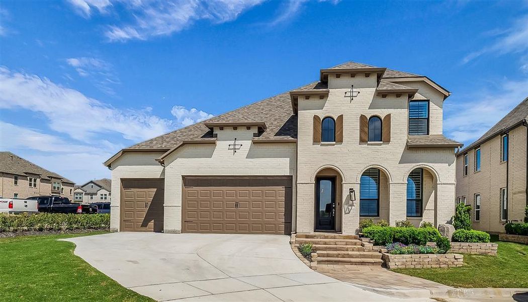 Front exterior of a new home in Bel Air Village, Sherman, TX, highlighting curb appeal (Image 2).